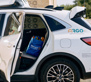 Image of Autonomous Ford/Argo vehicle with Walmart bag inside