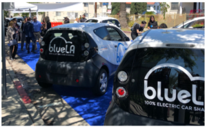 A picture of two parked electric car vehicles as part of the BlueLA car-sharing pilot.