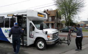 Image of riders boarding a DART Connect bus