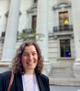 Photo of Francesca Lewis outside of the summit space, the St James Theater in Montreal