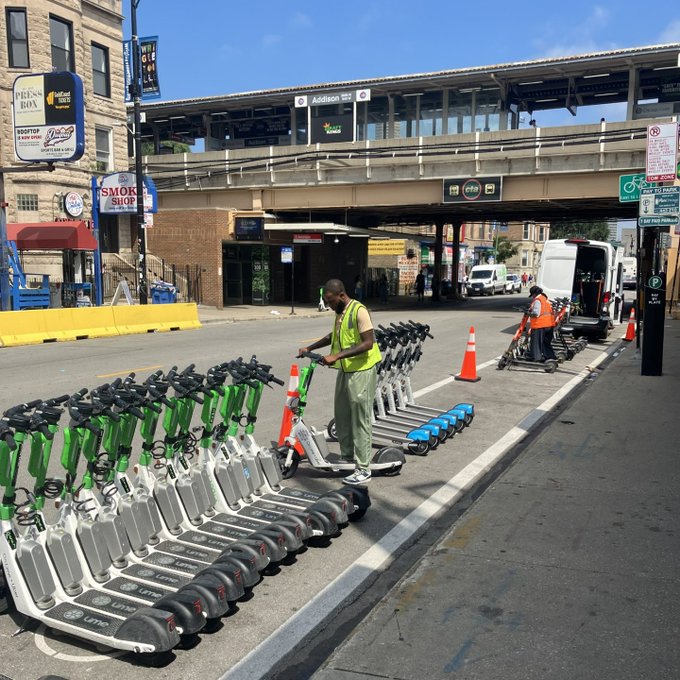 Several e-Scooters parked in a designated area