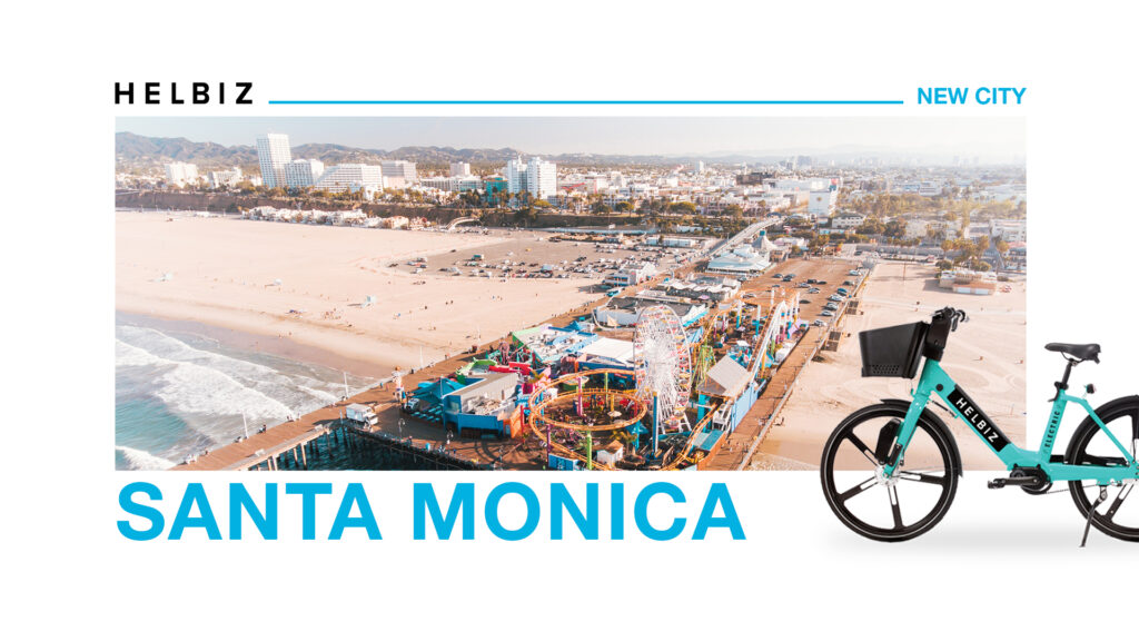 Promotional banner for Helbiz e-bike expansion in Santa Monica