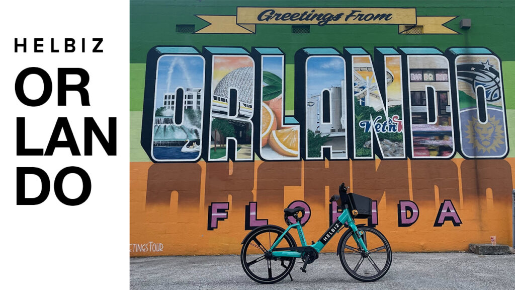 Image of Helbiz bicycle in front of Orland mural