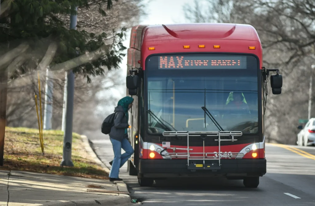 Passenger boards a Kansas City bus