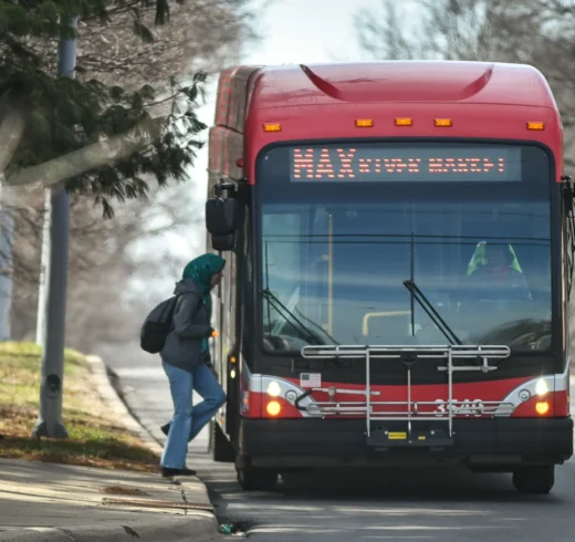 Passenger boards a Kansas City bus