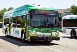 An electric bus in motion on the road. 