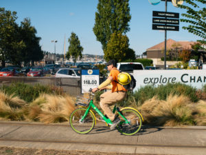 Photo of someone riding a bikeshare bike