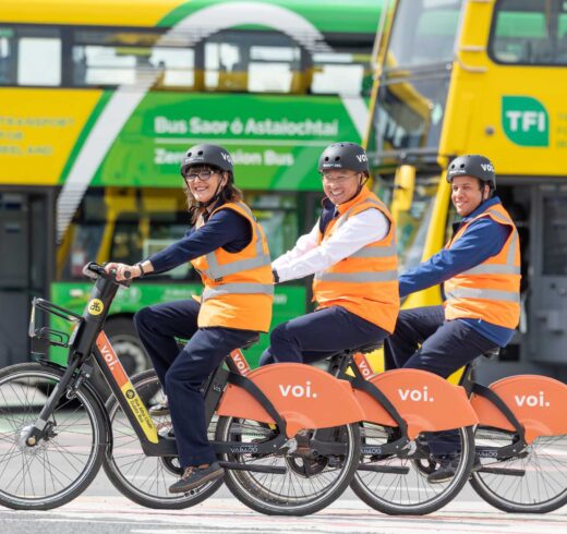 Image of Dublin Bus Employees riding Voi e-bikes