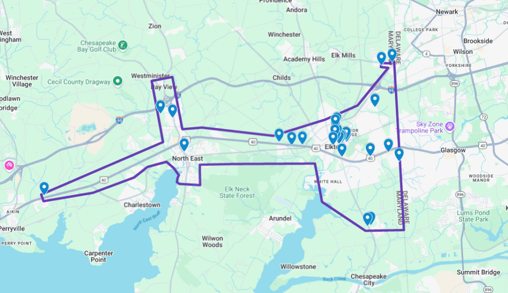 map of cecil county with compass' service area outlined in purple, and about 20 locations marked with blue icons