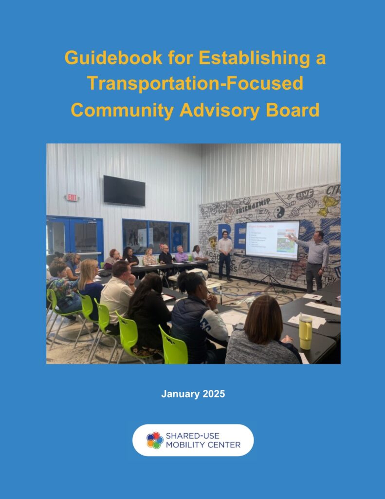 Cover of the guidebook with an image of several people sitting at tables viewing a presentation