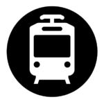 black circle with a white outline of a train head-on in the middle